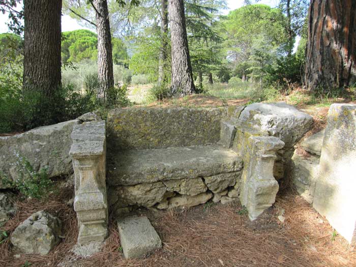 image of stone bench in forest